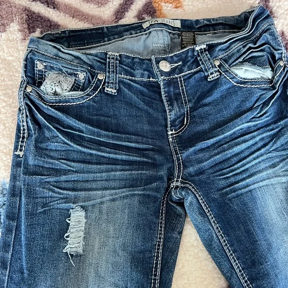 ZCO bootcut distressed jeans with design on back pockets. - Picture 2 of 4